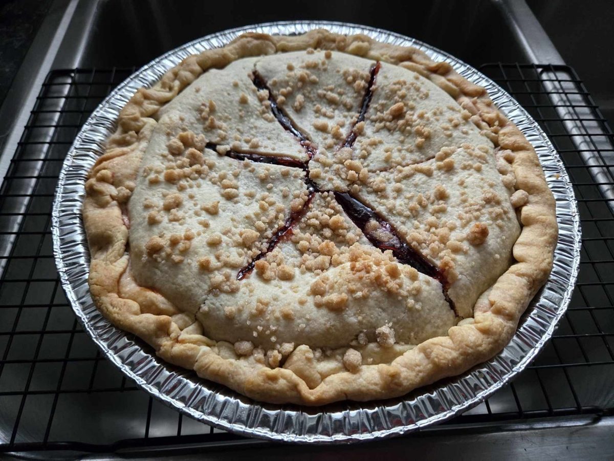 A fruit pie with a crumb top